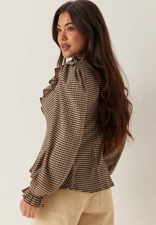 Jersey  Frill Peplum Blouse