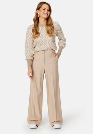 Tari LS O-Neck Jaquard Blouse